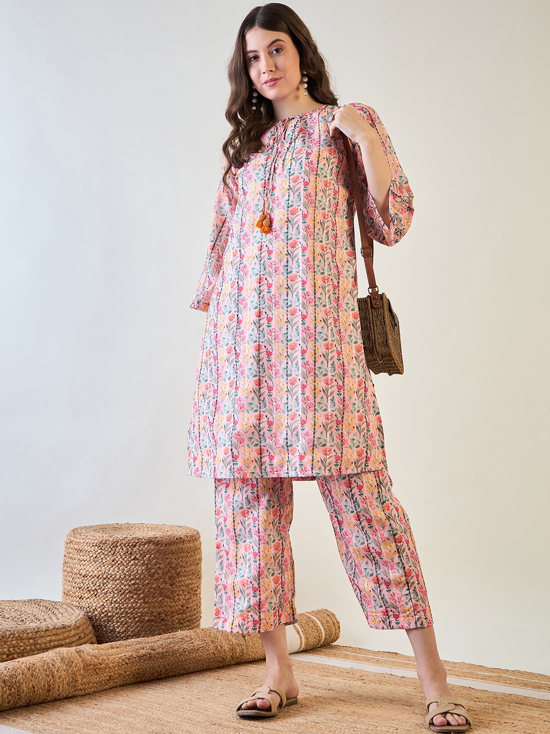 pink floral print on the cotton lurex co-ord set, designed for casual and festive wear.