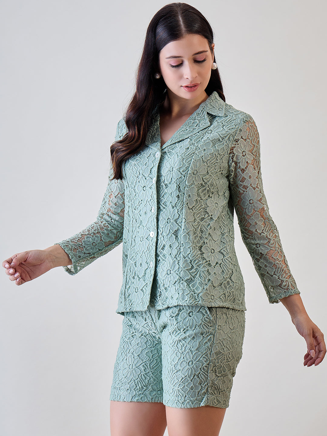 Add a touch of femininity to your wardrobe with the Pastel Green Delicate Floral Lace Jacket and Shorts Cord Set
