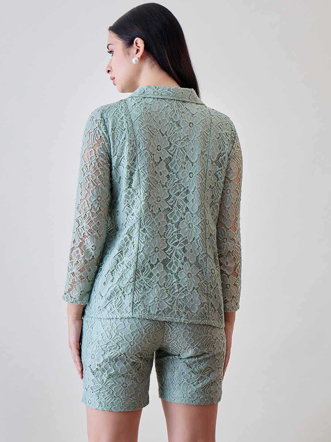 Stay cozy and chic in the Pastel Green Delicate Floral Lace Jacket and Shorts Cord Set, designed for comfort and flair
