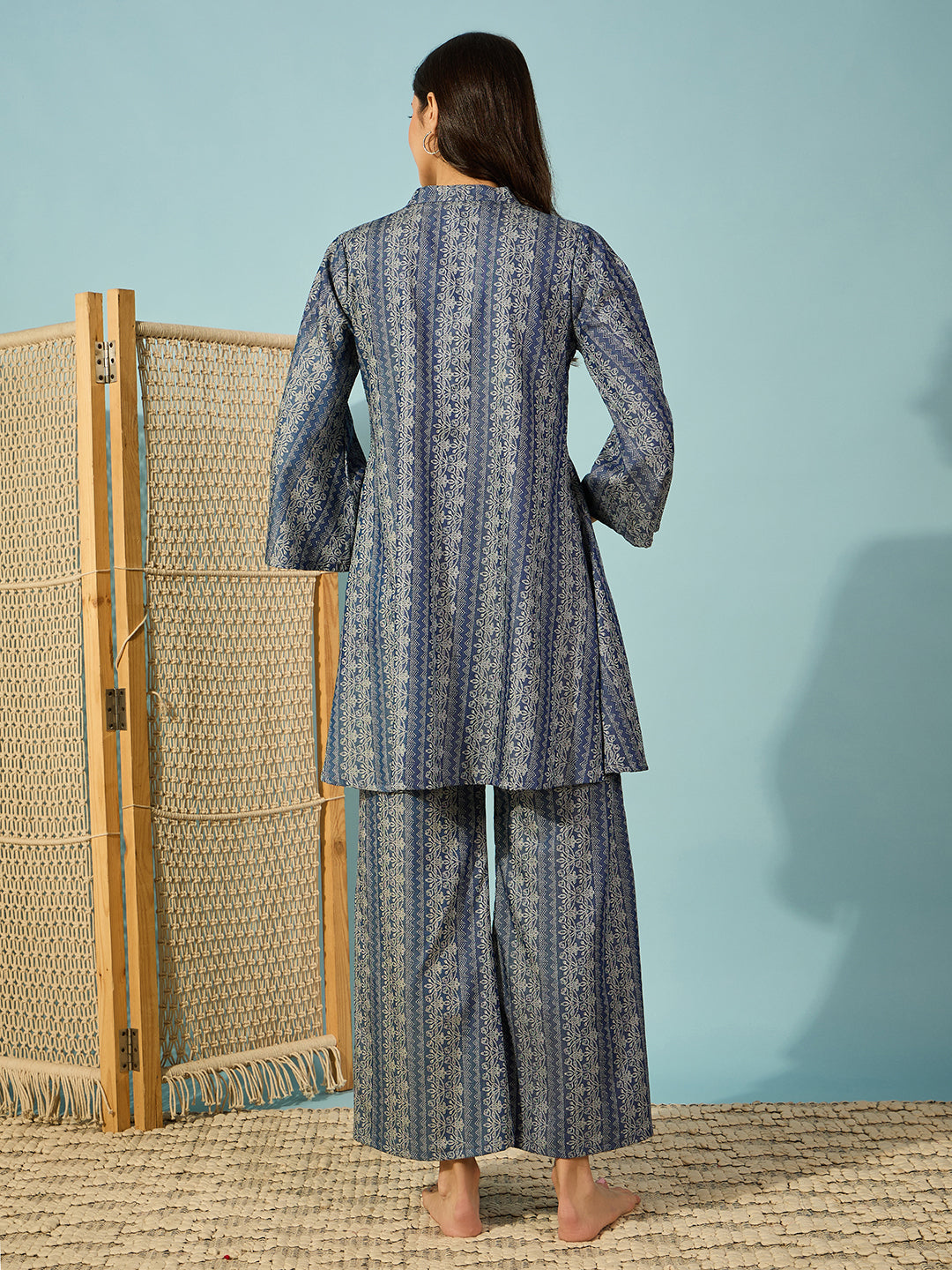 Stylish and comfortable light denim co-ord set, ideal for casual outings with a buttoned shirt and wide legs.
