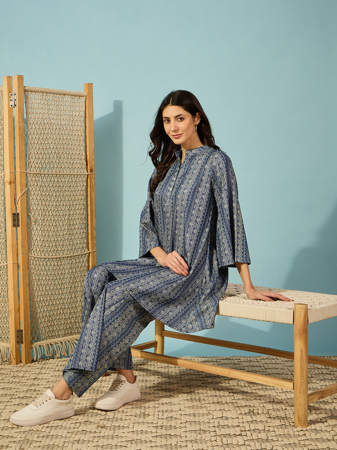 Comfort meets style in this light denim co-ord set with a self-printed fabric design and wide-legged bottoms.
