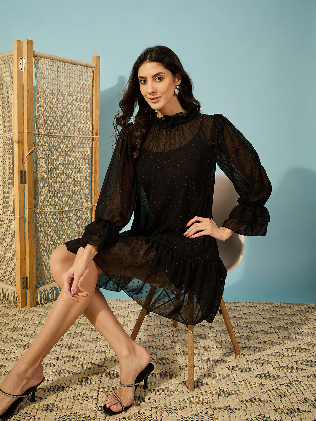 Effortlessly stylish black ruffle dress with dobby fabric - Perfect for a night out.
