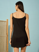 Timeless black ruffle dress made from dobby georgette - Your go-to dress for any occasion.
