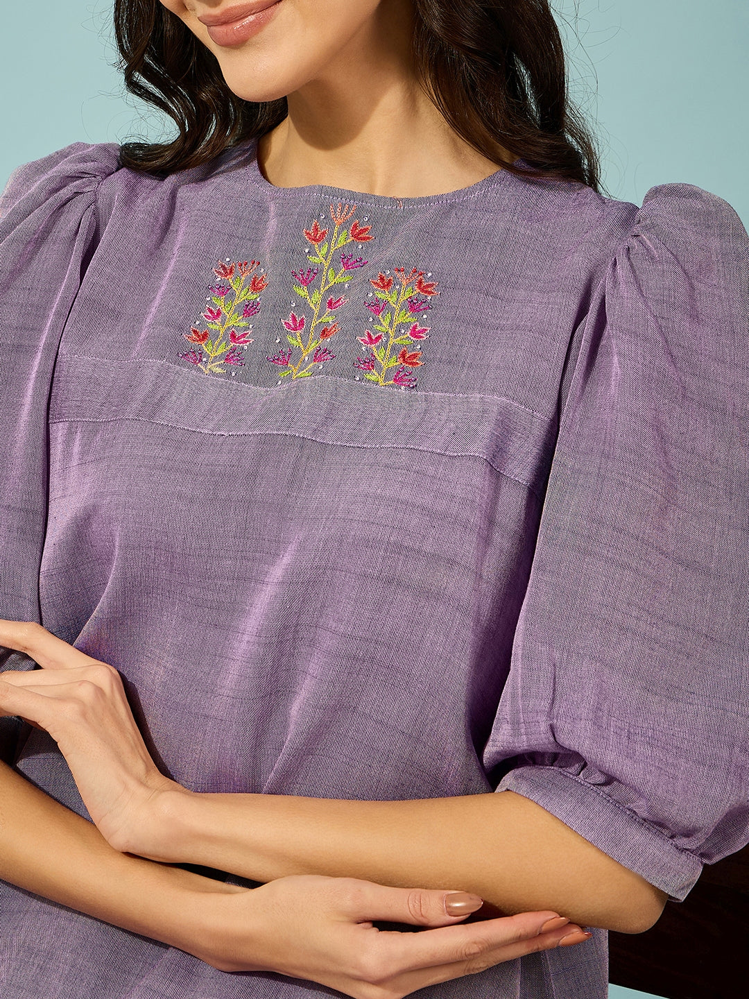 Unique purple hand-embroidered knee length dress with a tiered skirt, perfect for casual or formal wear.

