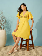 Yellow Hand-Embroidered Viscose Linen Dress for Women - Stylish knee-length comfort.
