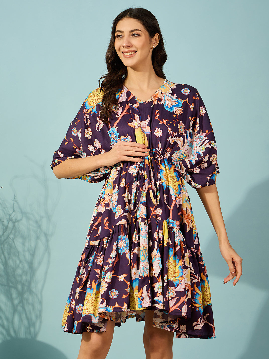 Women Burgundy floral maternity dress with a super soft fabric and adjustable waist tie for a flattering fit.
