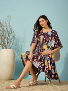 Elegant burgundy floral maternity dress with an adjustable waist tie, offering a perfect fit for every stage.
