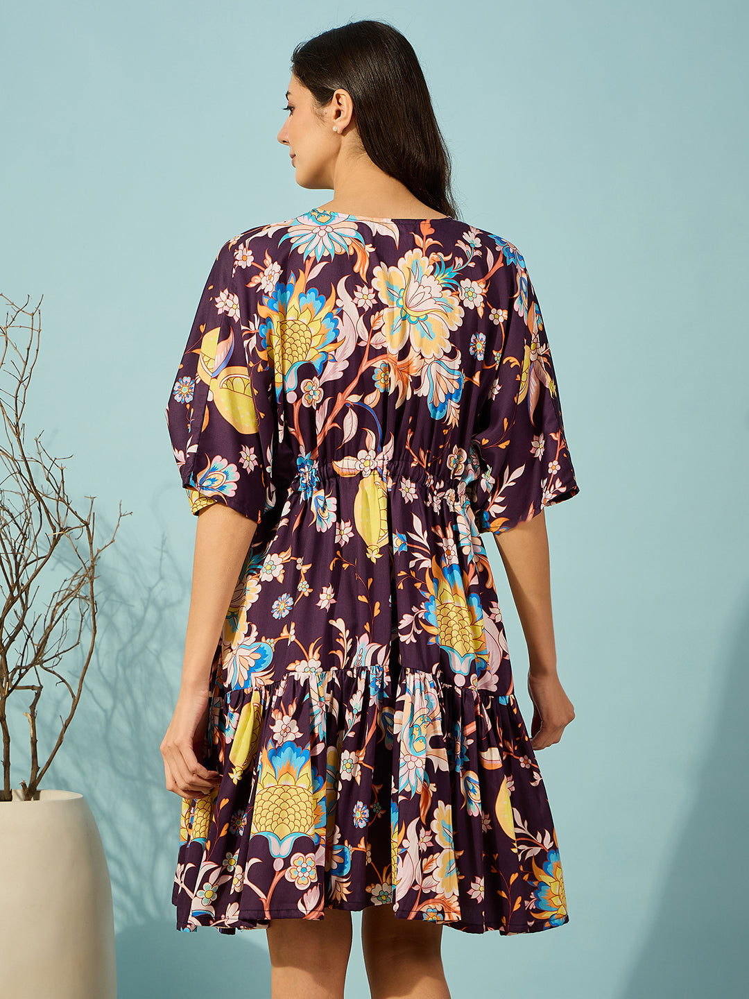 Soft, burgundy floral maternity dress featuring a comfortable fit with nursing access for new moms.

