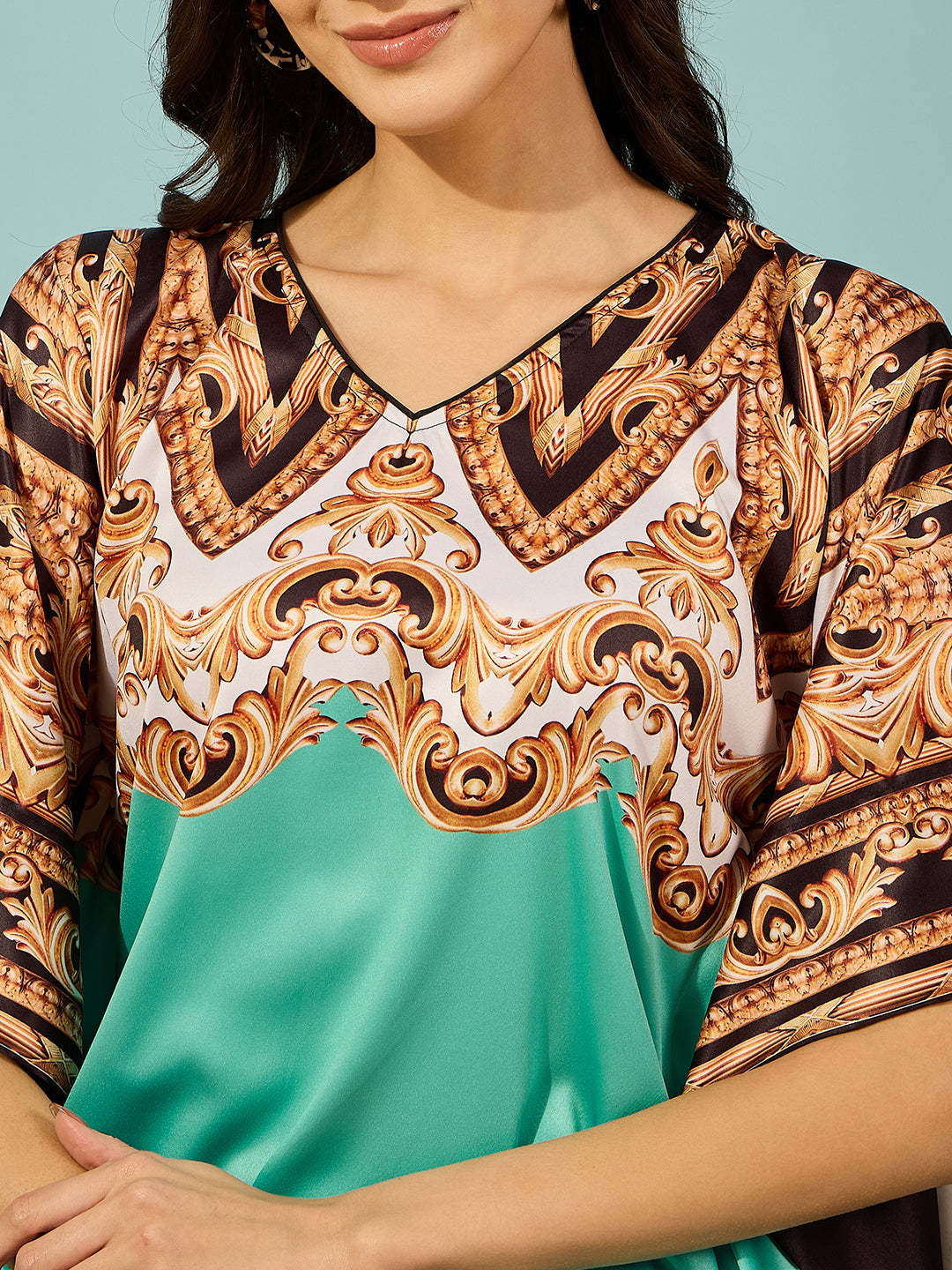 Stunning light green baroque printed satin kaftan dress with a V-neckline, offering a chic and flattering fit.
