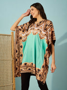 Luxurious light green satin kaftan dress with baroque print and V-neckline, ideal for evening events.
