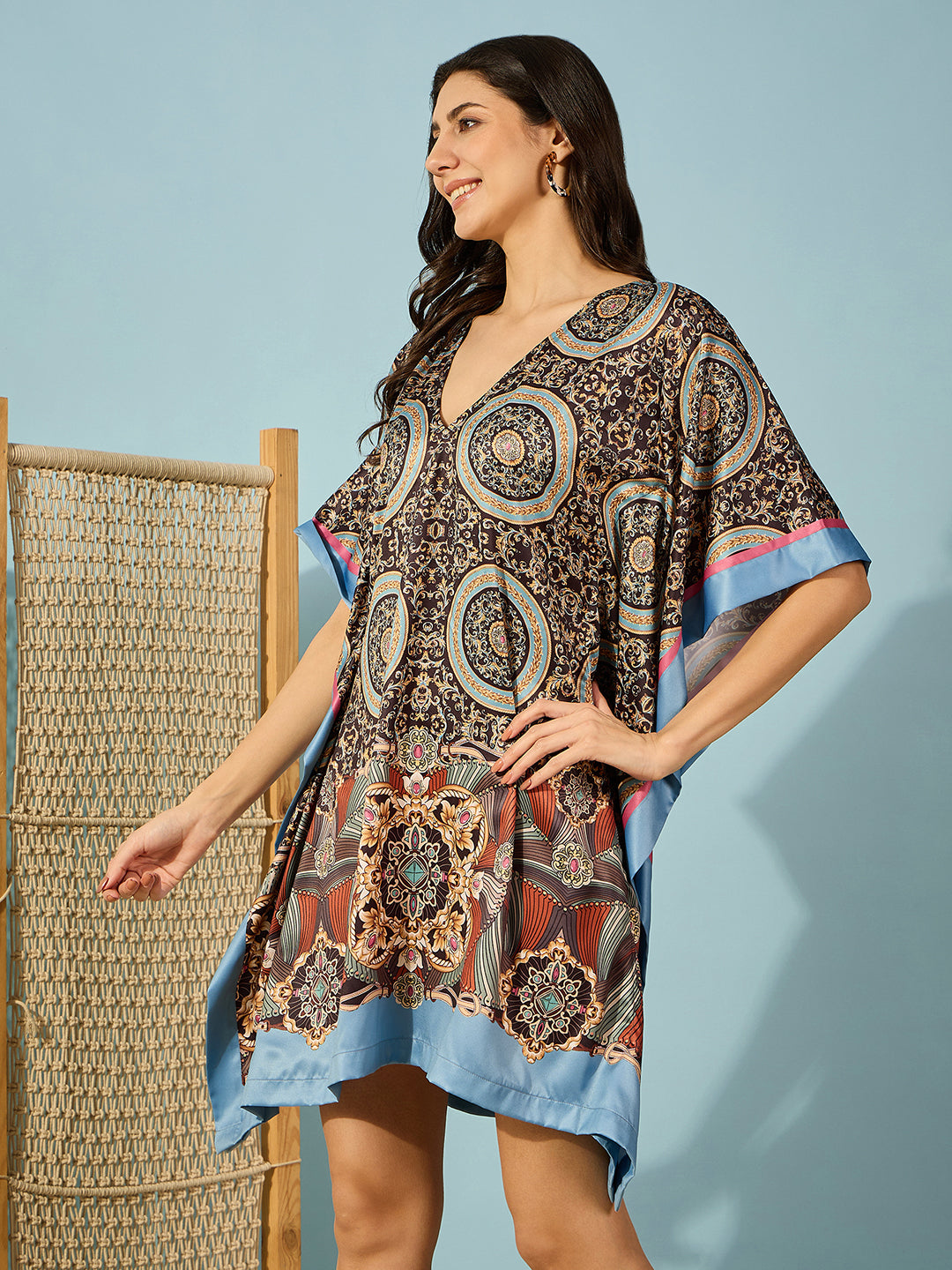 Chic black satin kaftan dress with decorative baroque print â‚¬€œ perfect for cocktail parties and weddings.
