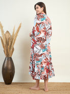 Stylish and practical white maternity kaftan for expectant mothers