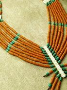 Versatile orange and blue Naga bead necklace perfect for brightening up any outfit, from casual to dressy.
