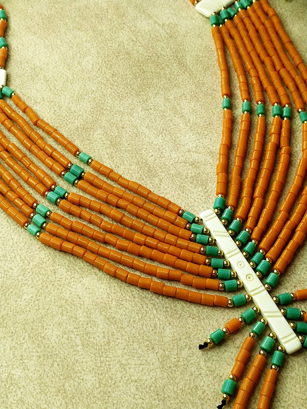 Versatile orange and blue Naga bead necklace perfect for brightening up any outfit, from casual to dressy.
