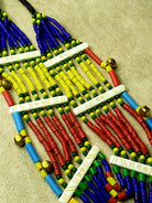 Chic layered necklace designed with a blend of vibrant beads and playful bells, adding a whimsical flair to any ensemble.
