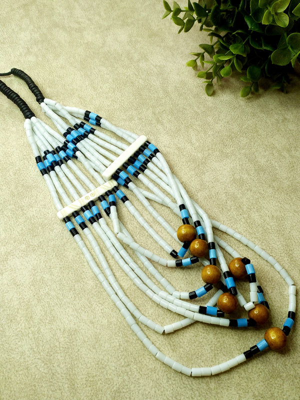 Chic necklace designed with a blend of white Naga and wooden beads, adding texture and style to any ensemble.
