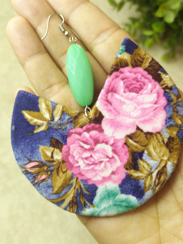 Oversized handmade fabric earrings featuring a bold and colorful design, perfect for making a statement.
