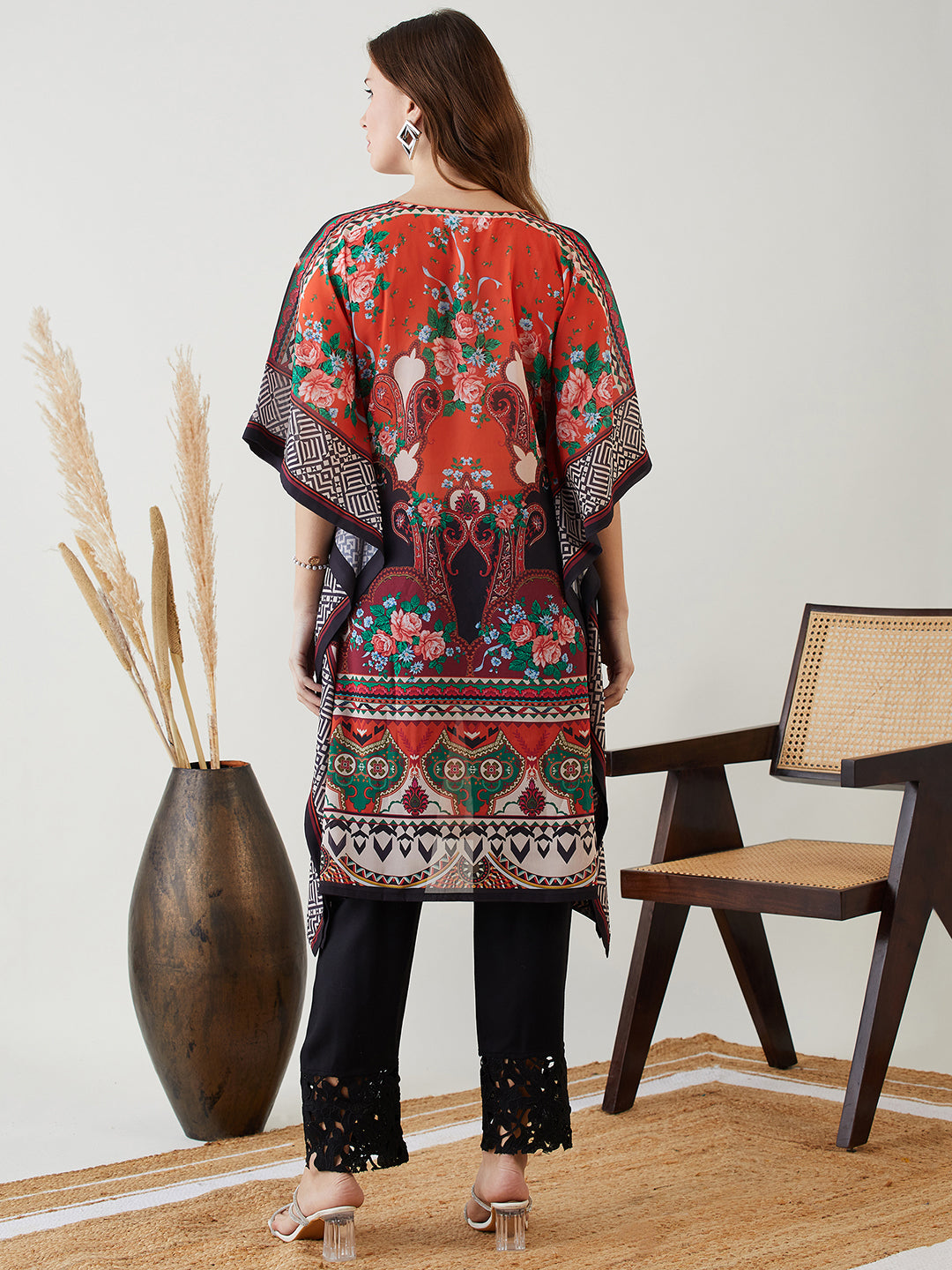 Stylish black kaftan kurti with a V-neckline and three-quarter length sleeves