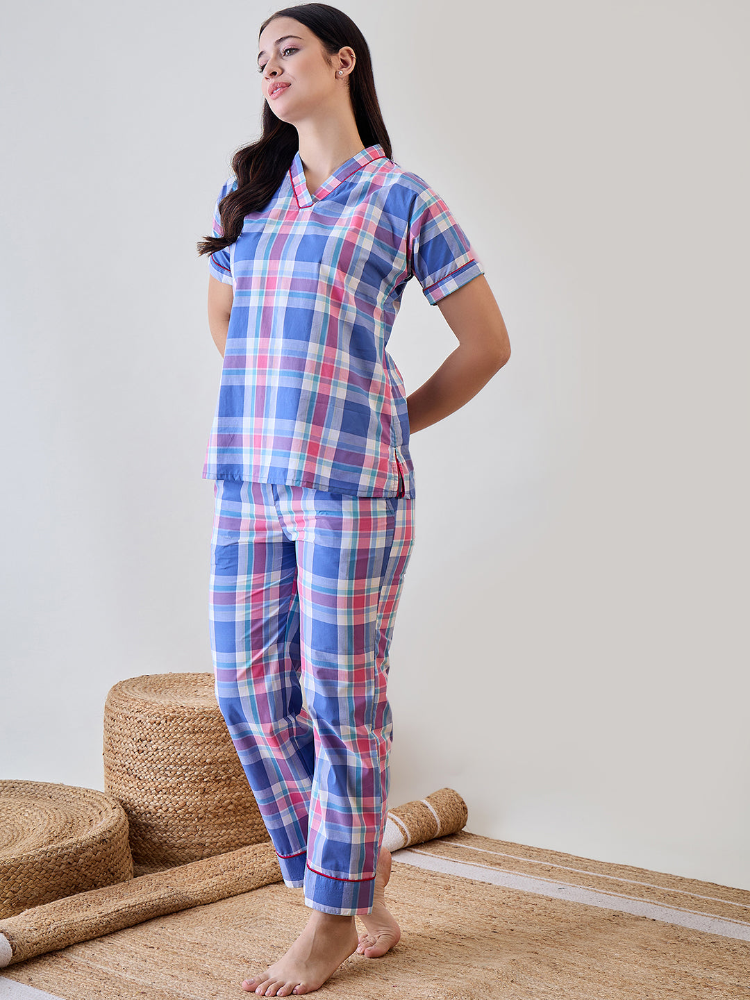 Soft blue and pink checkered cotton pyjama set with a comfortable fit, ideal for casual sleepwear.
