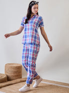 Women's cotton pyjama set in blue and pink checkered pattern, perfect for cozy nights and relaxed lounging.
