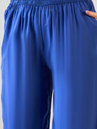 Relaxed-fit pajama set with vibrant stripes and comfortable blue pants.