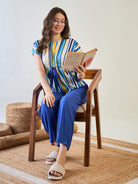 Comfortable co-ord set featuring blue pajamas and a striped top.