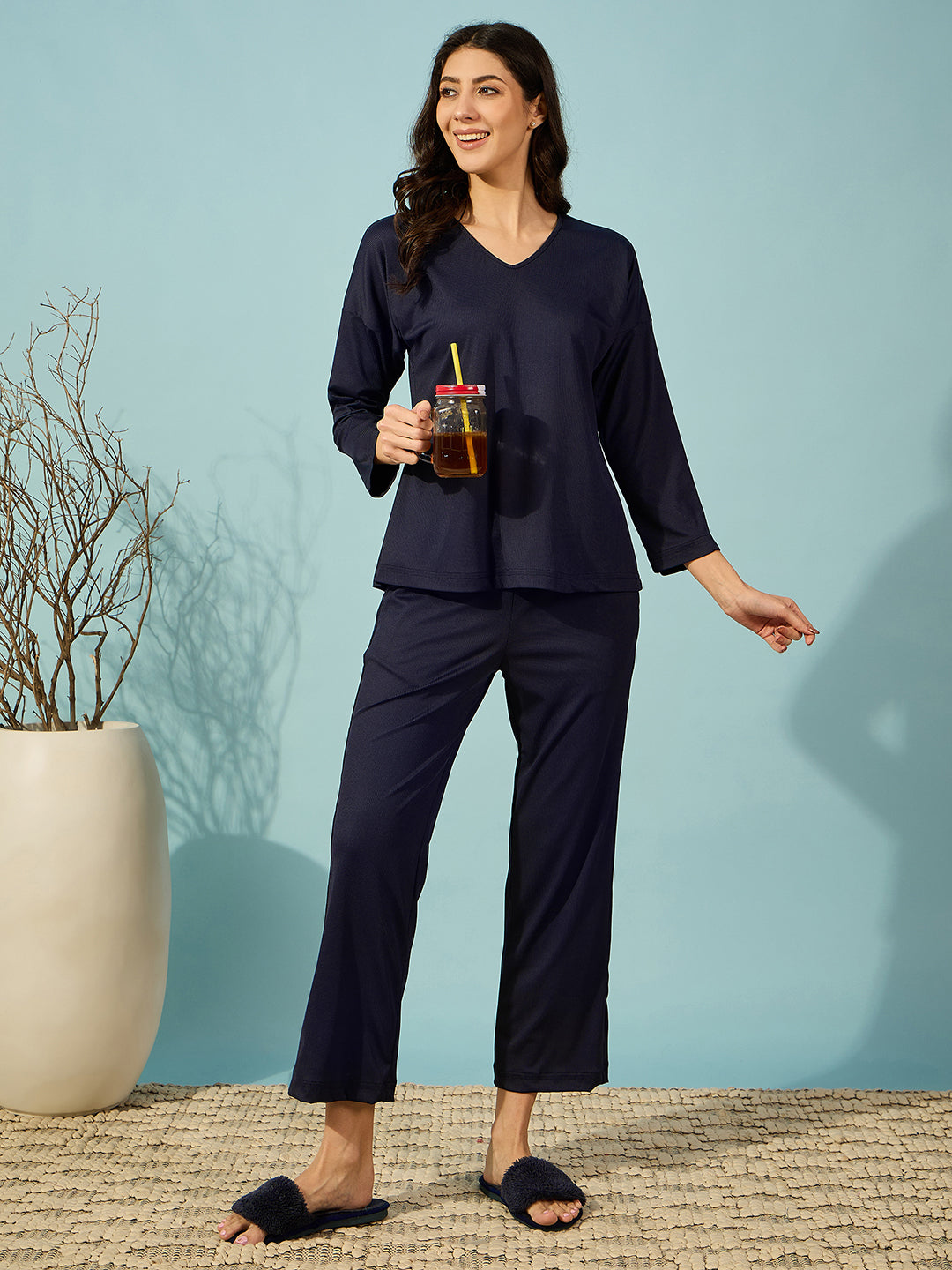 Indulge in comfort with this navy ribbed pyjama set, perfect for lounging or restful sleep.

