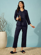 Indulge in comfort with this navy ribbed pyjama set, perfect for lounging or restful sleep.
