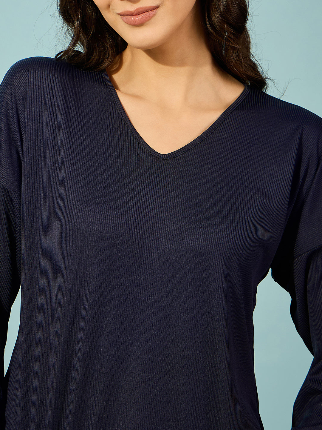 Lounge in luxury with this navy ribbed pyjama set, complete with full sleeves and a relaxed fit.
