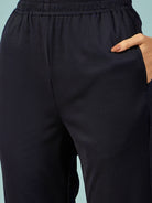 Luxurious ribbed navy pyjama set with a relaxed fit, ideal for lounging or sleep.
