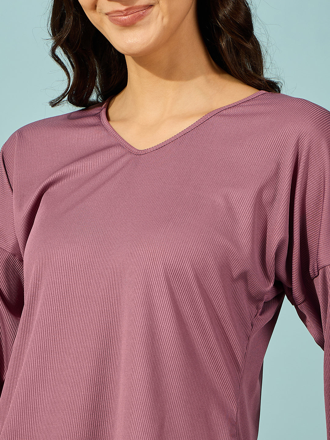 Soft and breathable purple ribbed pyjama set for women, perfect for a good nightâ‚¬„¢s rest.
