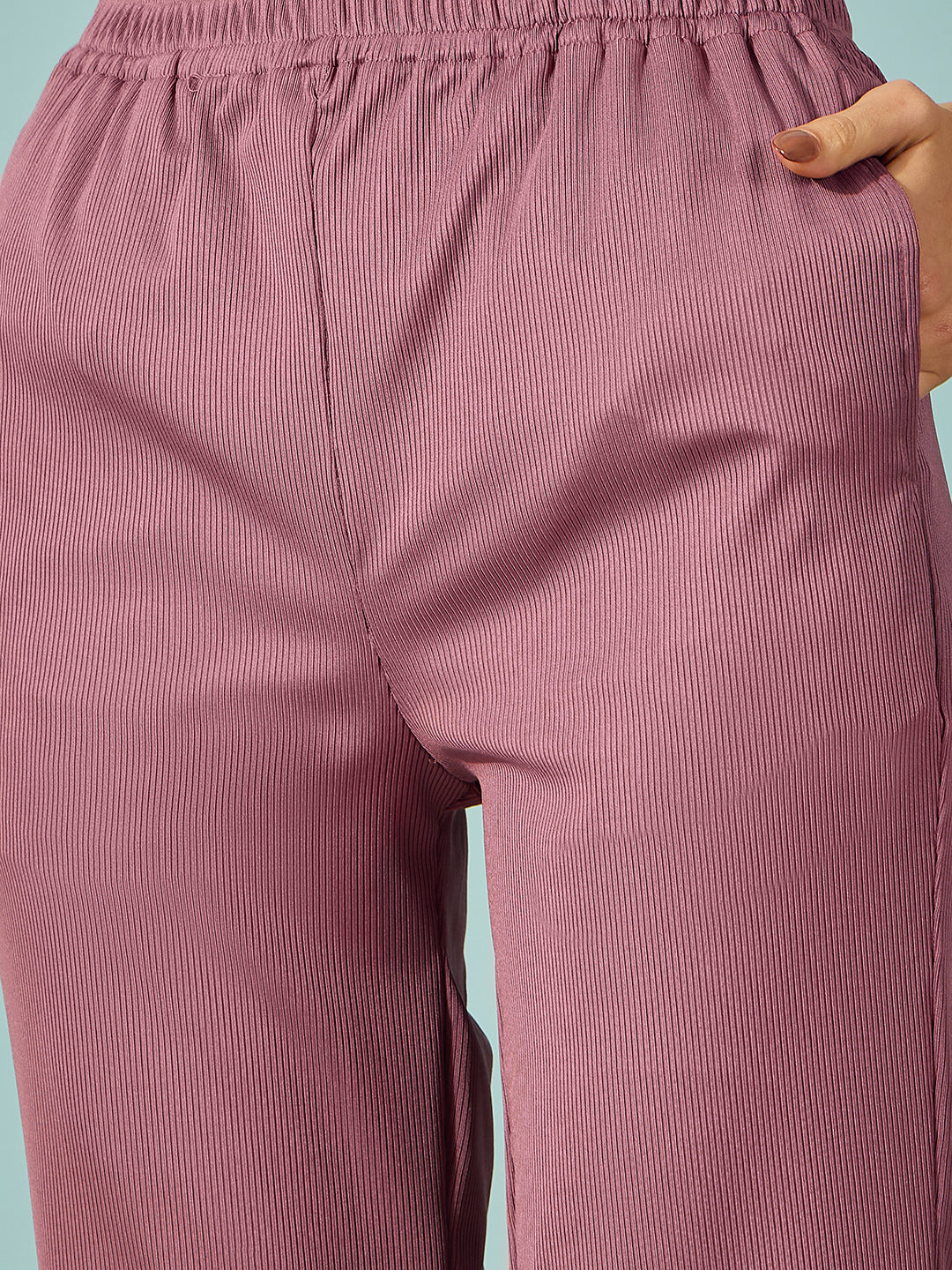 Purple ribbed pyjama set for women with a relaxed, comfy fitâ‚¬€�perfect for lounging at home.
