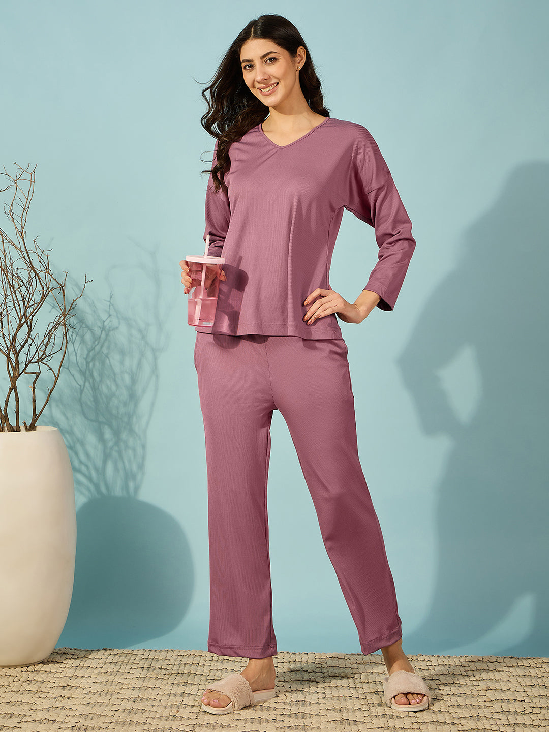 Soft purple ribbed pyjama set, ideal for women seeking comfort with a chic design.
