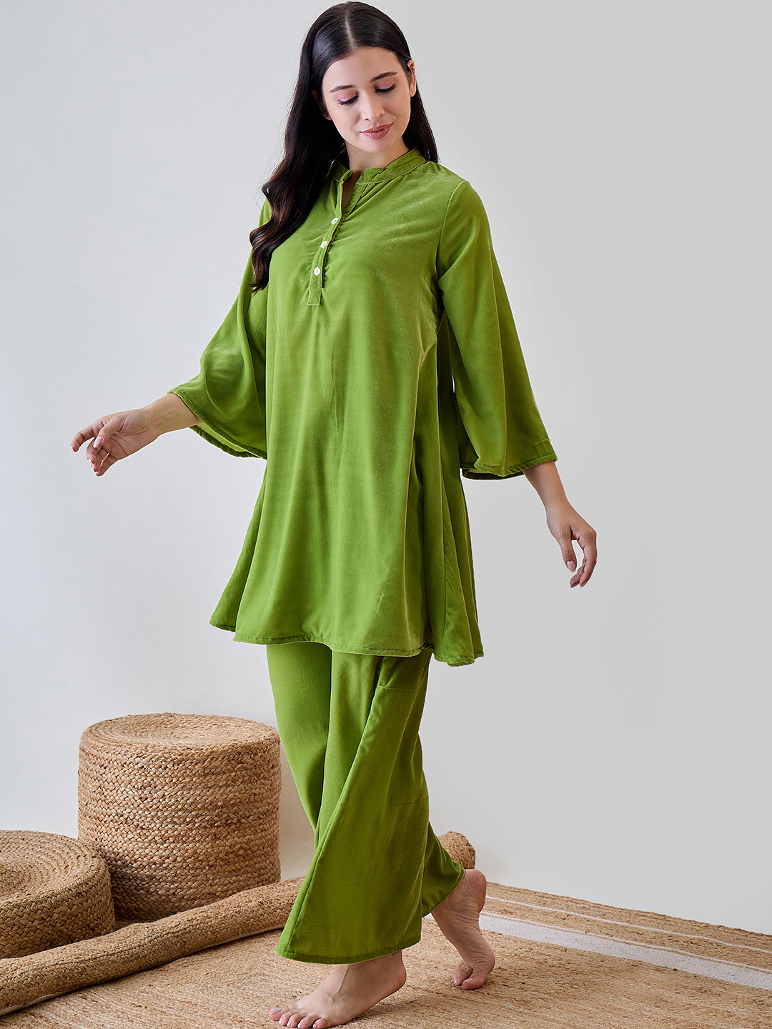 Stay relaxed and chic in the Green Solid Minimalistic Pyjama Set, perfect for casual days.
