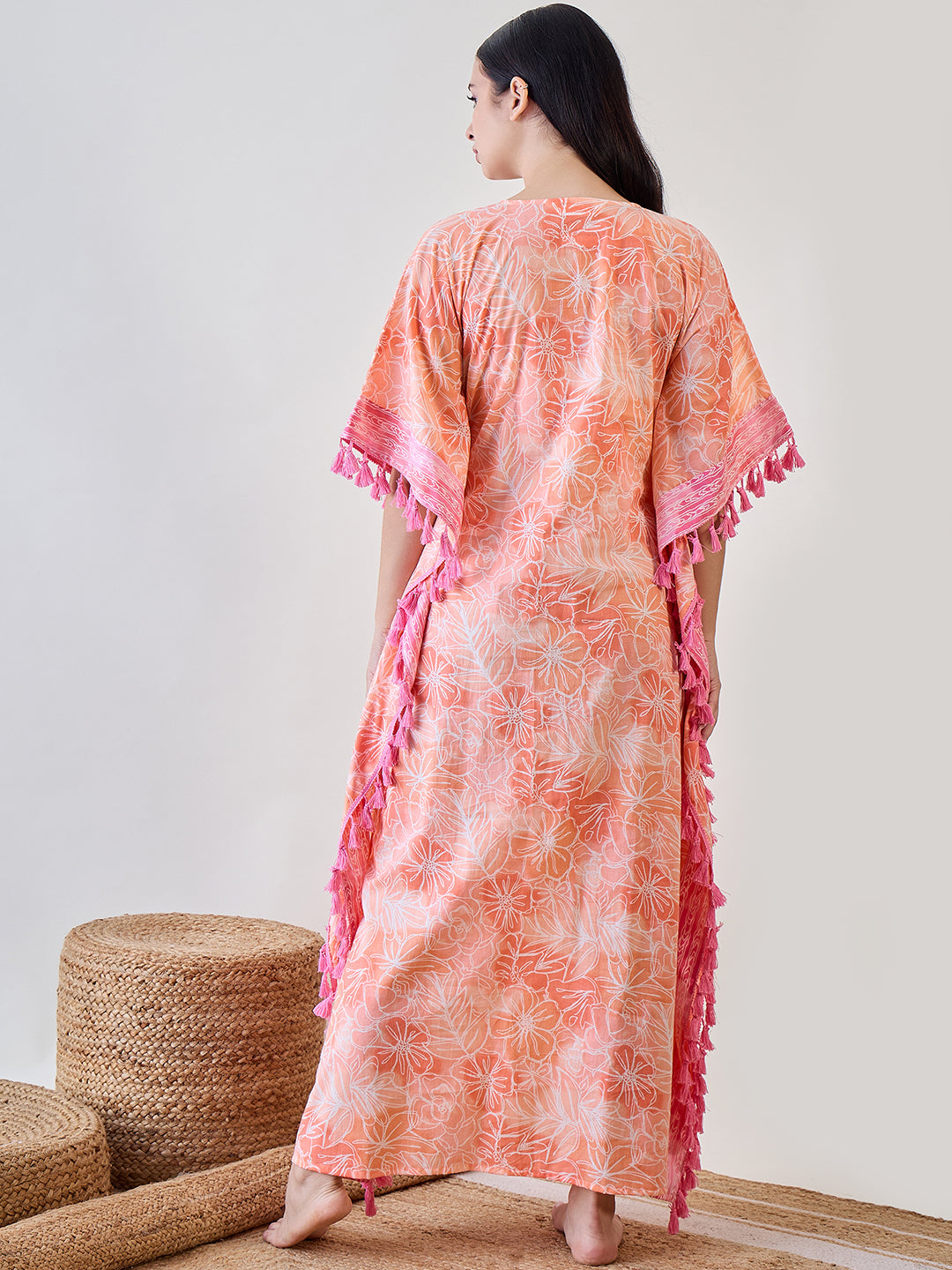 Experience ultimate comfort and style with the Orange Abstract Floral Pink Tasseled Cotton Kaftan Nightdress
