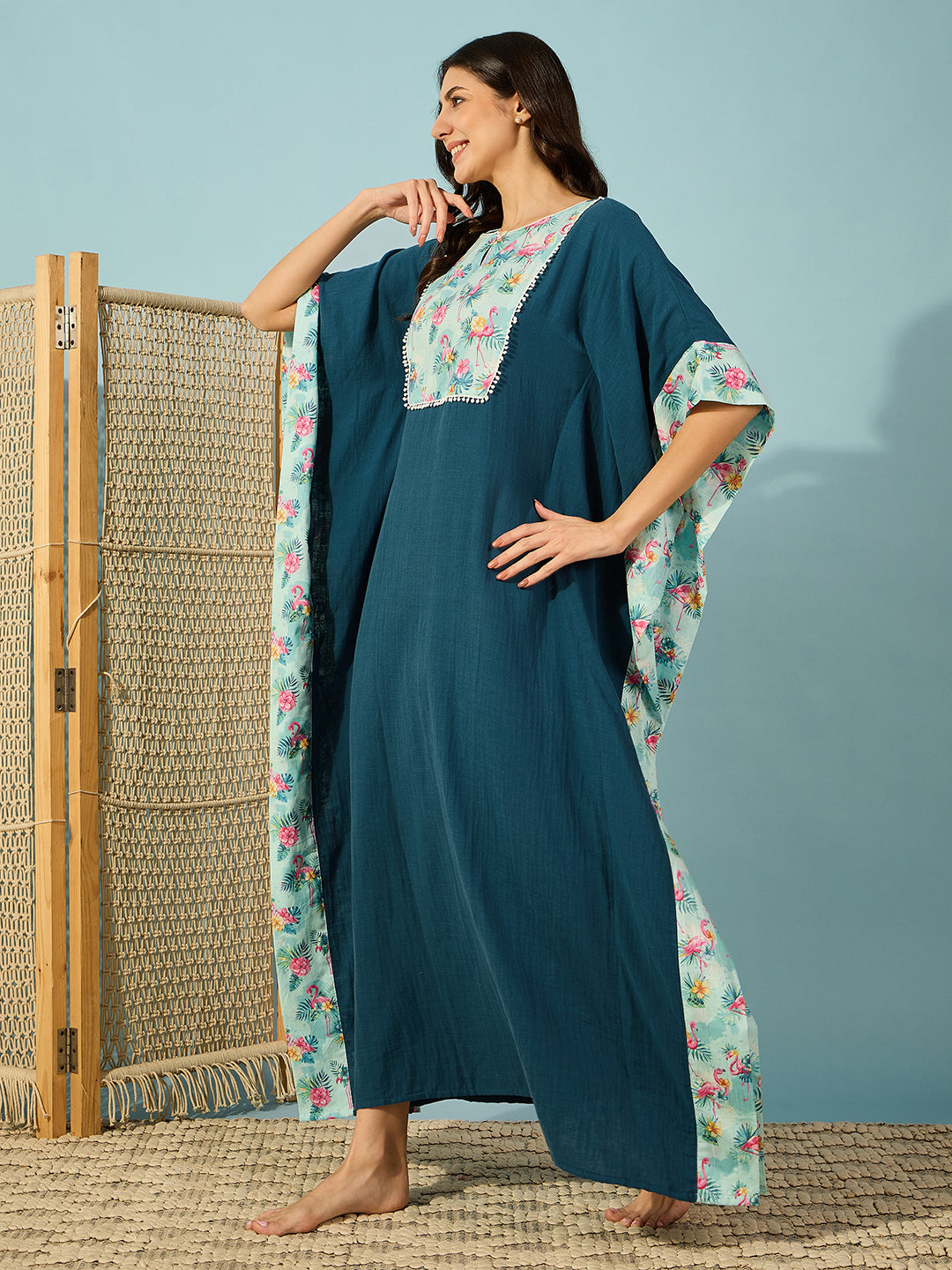Chic Blue Flamingo Yoke maxi length Kaftan for women, slim fit with playful flamingo print.
