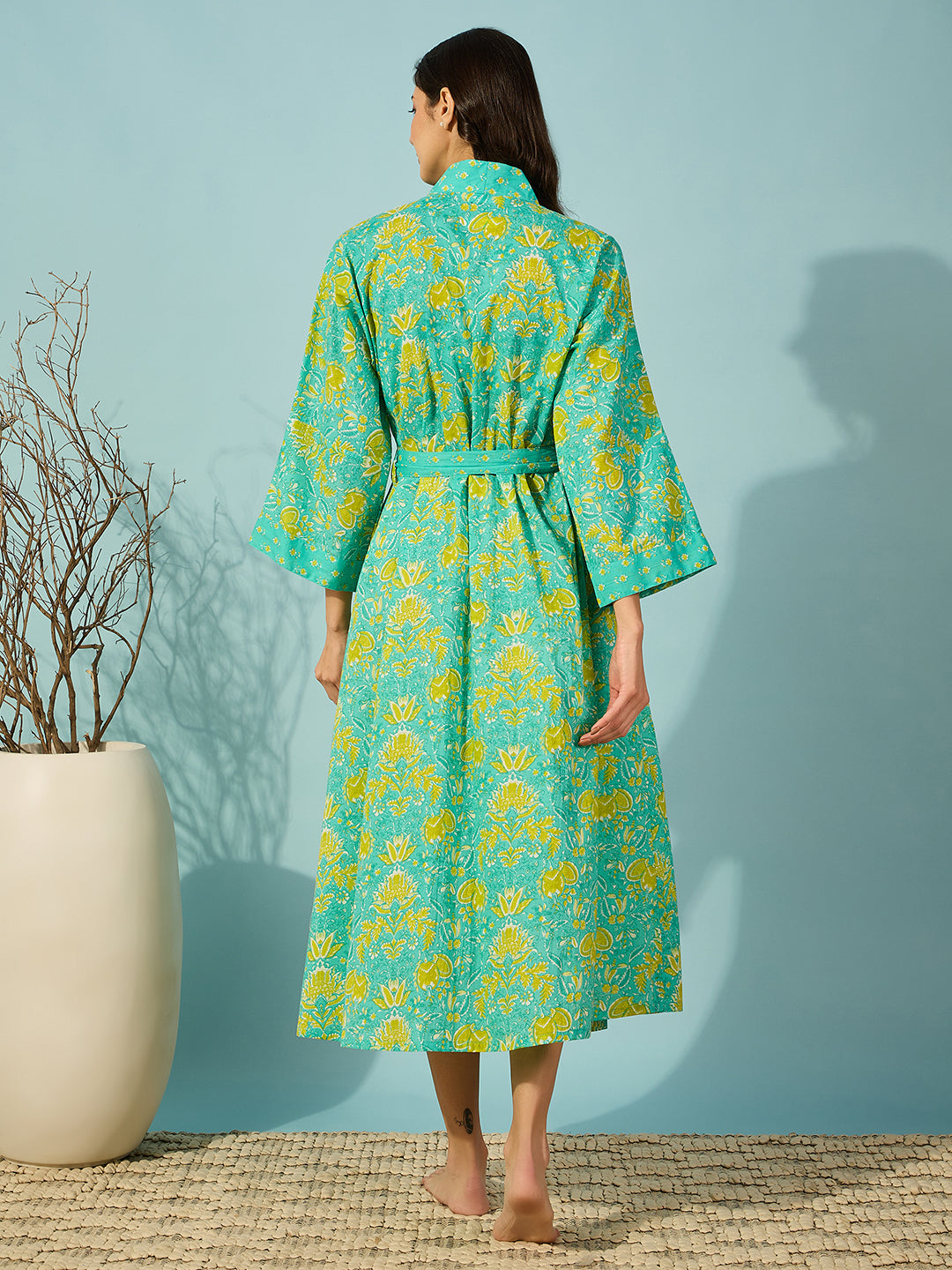 Blue floral cotton wrap gown perfect for cozy nights and elegant lounging.
