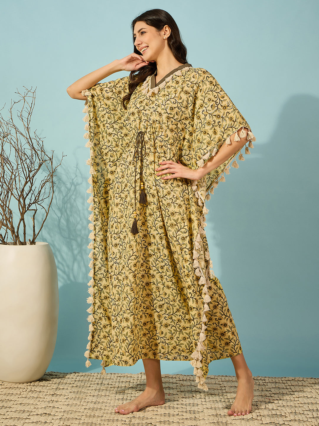 Women's floral yellow kaftan - Hand block printed with tassel embellishments for a boho-chic vibe.
