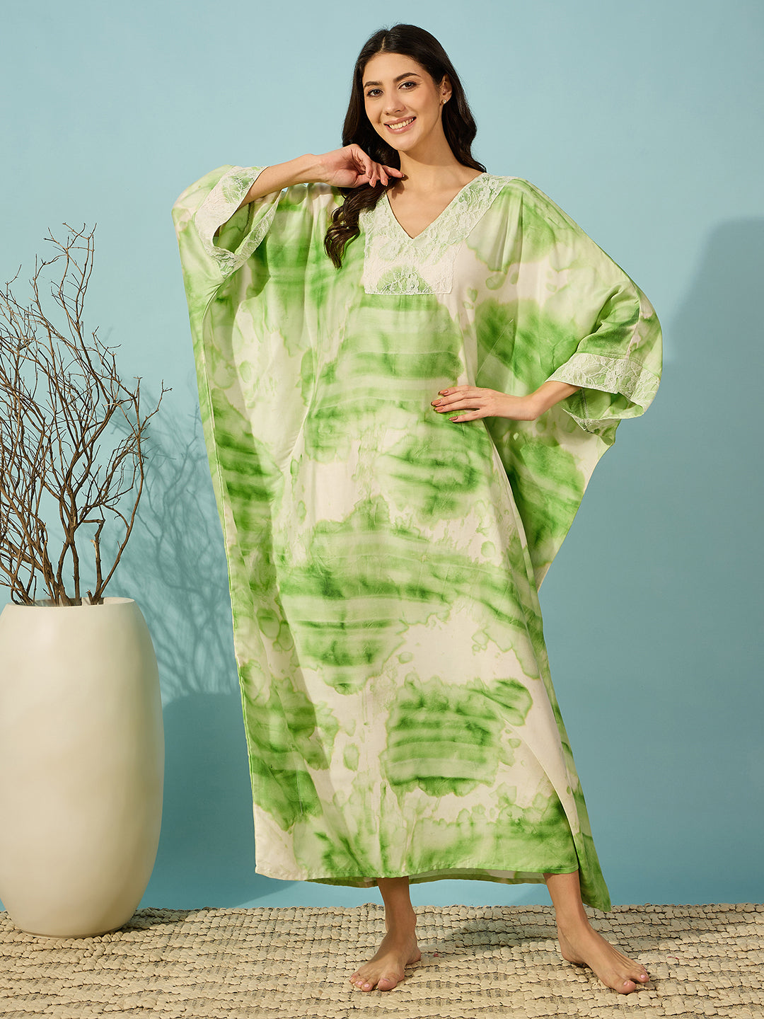 Comfort and luxury blend in this green tie-dye nightdress with a beautiful lace yoke detail.
