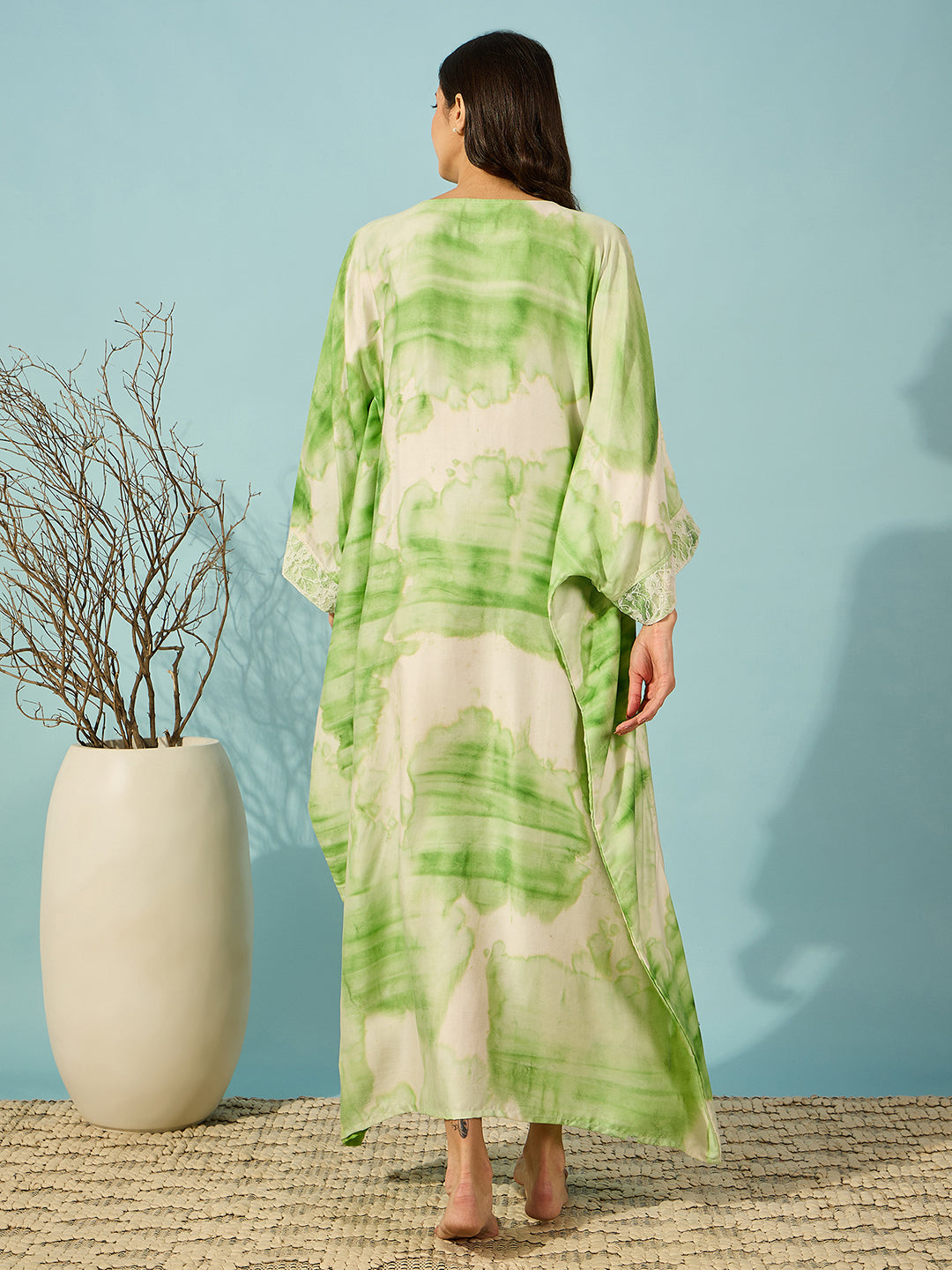 Green tie-dye nightdress with lace yoke, offering a loose fit and serene comfort for your nightwear collection.
