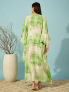 Green tie-dye nightdress with lace yoke, offering a loose fit and serene comfort for your nightwear collection.
