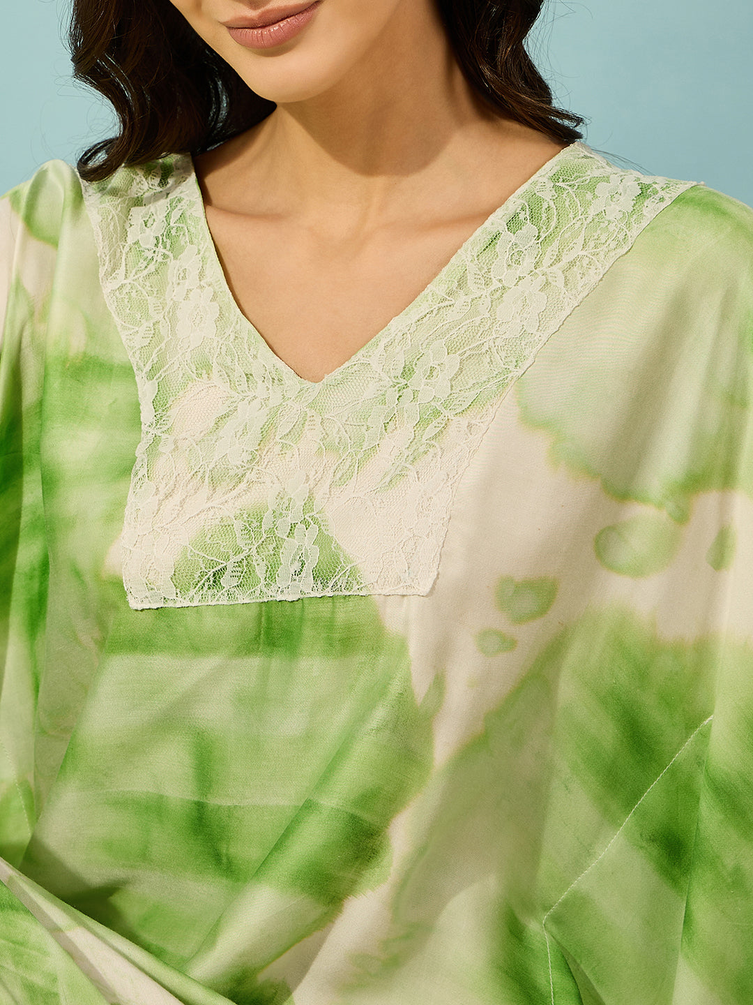 Add a touch of elegance to your nighttime wardrobe with this green tie-dye nightdress with a lace yoke.

