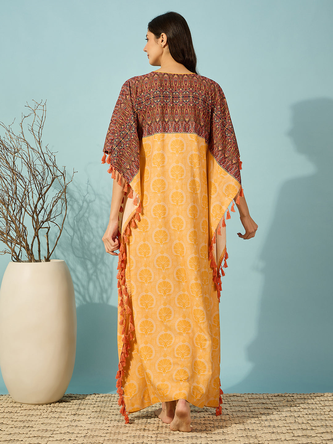 Relax in style with this Golden Bloom Maternity Kaftan, featuring beautiful tassel details.
