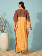Relax in style with this Golden Bloom Maternity Kaftan, featuring beautiful tassel details.

