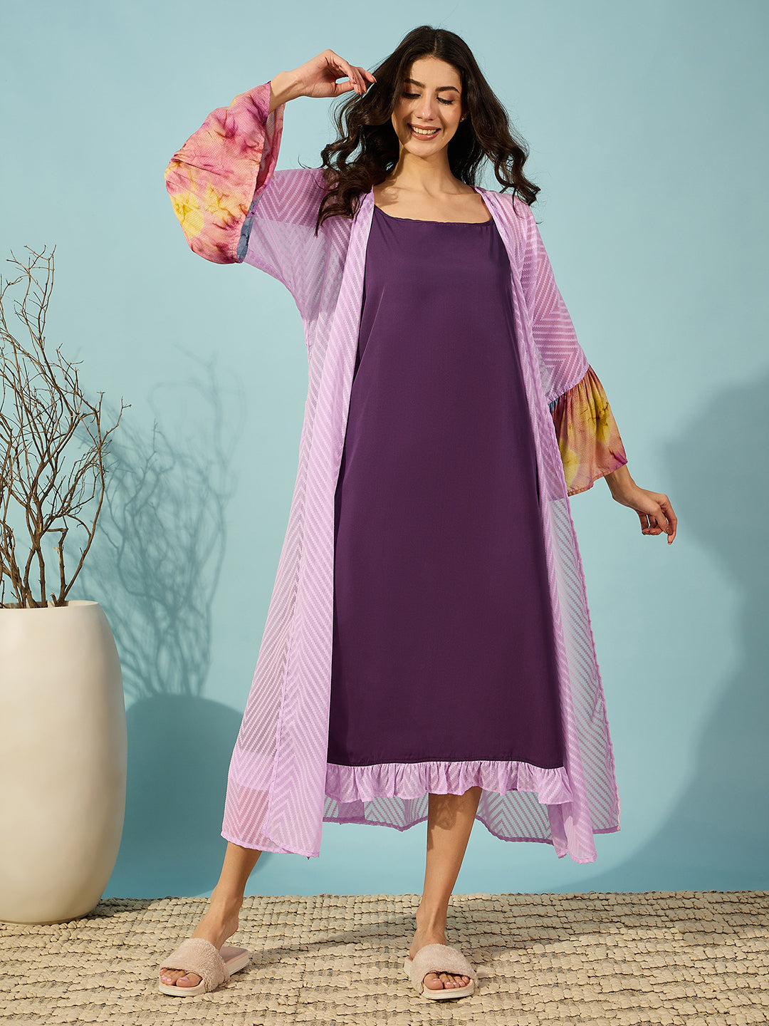 Elegant lavender georgette gown with a stylish slip set, featuring unique tie-dye patchwork on the sleeves.
