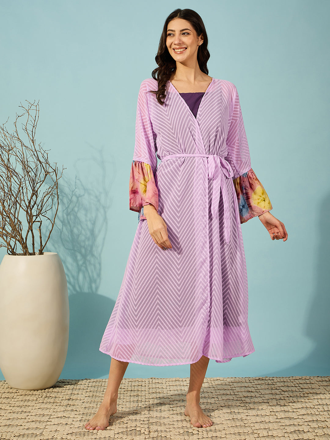 Sophisticated lavender gown set with ruffled slip and tie-dye sleeve accents for a trendy twist.
