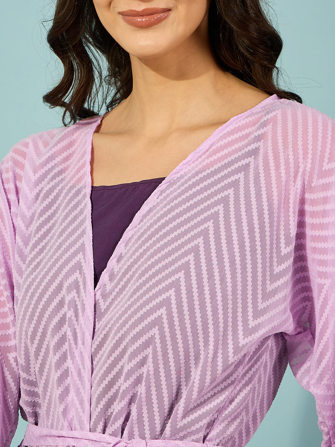 Stunning lavender gown set with a ruffled slip and artistic tie-dye detail on the sleeves.

