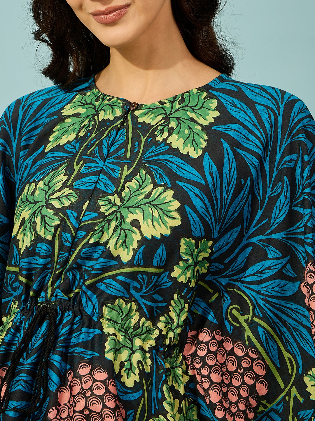 Trendy and practical blue floral maternity kaftan, knee-length, for womenâ‚¬„¢s comfortable wear.
