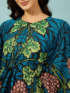 Trendy and practical blue floral maternity kaftan, knee-length, for womenâ‚¬„¢s comfortable wear.
