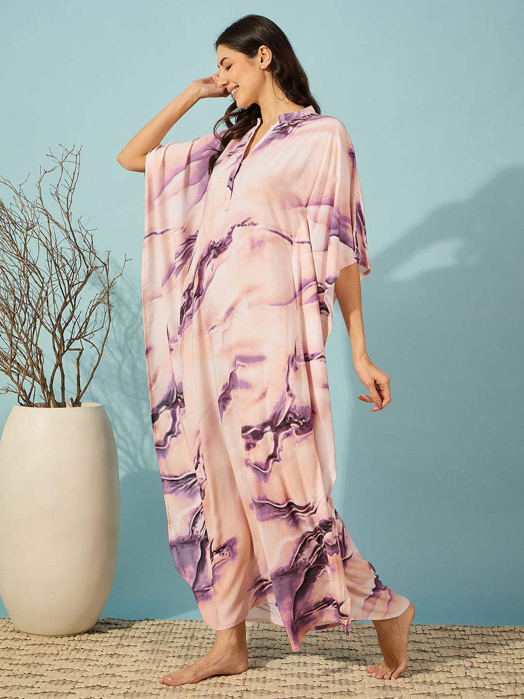 Luxurious purple marble print kaftan dress with mandarin collar and button placket for women.

